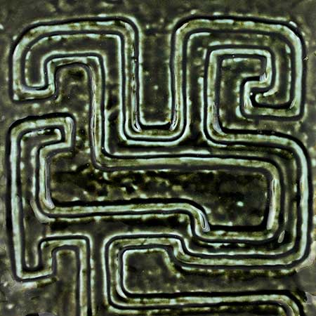Gunnar Nylund Rörstrand The Farina decor with forest green glaze, and labyrinth relief