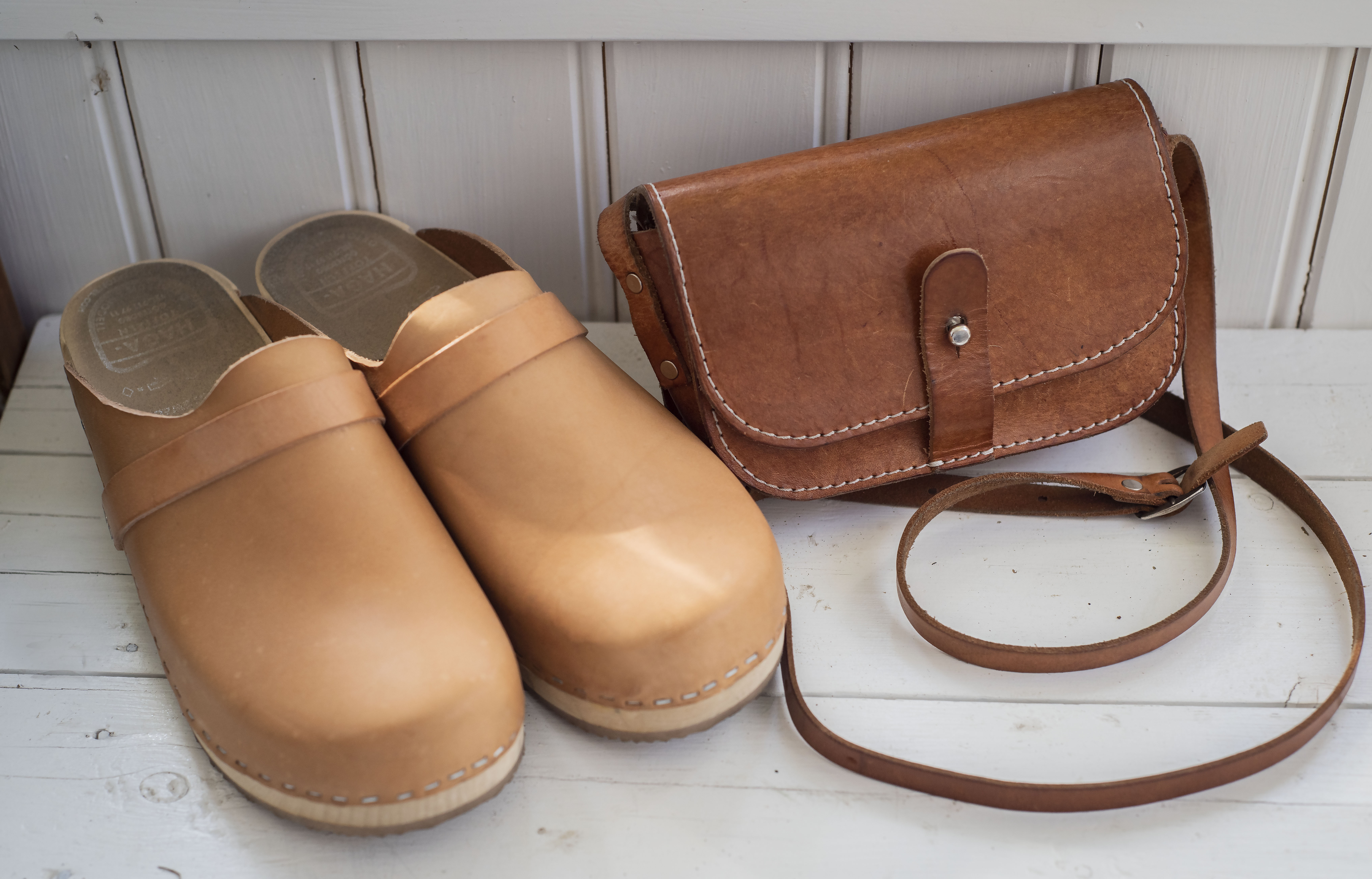 brown clogs with strap